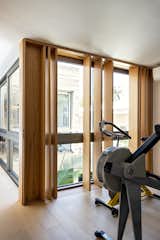 Articulated Brise-soleil controls natural light at the Gym.