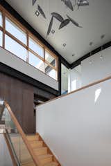 The walnut architectural element on the second floor from the stairs,.