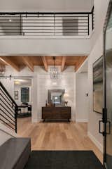 Entry with oversized shiplap and white oak flooring