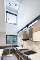 Kitchen and banquette, skylights!