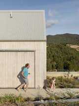 Ecofriendly vertical timber cladding by New Zealand company Abodo Wood LTD, a Tundra cladding with a natural sustainable finish that will silver with age.