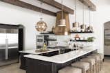 Kitchen, Refrigerator, Pendant Lighting, Dishwasher, Wall Oven, Range Hood, Stone Slab Backsplashe, Recessed Lighting, Ceramic Tile Floor, Microwave, and Drop In Sink Kitchen  Photo 2 of 15 in Greatwater Retreat by Brianna Michelle Interior Design