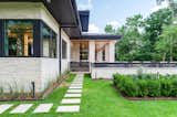 Exterior, Metal Roof Material, Mid-Century Building Type, and House Building Type Outdoor Living - Side Entrance   Photo 17 of 19 in Mid Century Modern by Tongue & Groove Design + Build