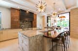 Kitchen, Marble Counter, Wood Counter, Recessed Lighting, Accent Lighting, Drop In Sink, Ceiling Lighting, and Pendant Lighting Main Kitchen   Photo 18 of 19 in Mid Century Modern by Tongue & Groove Design + Build