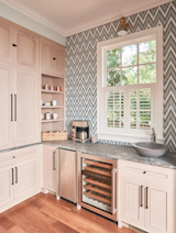 Kitchen, Pendant Lighting, Mosaic Tile Backsplashe, Vessel Sink, Wood Cabinet, Marble Counter, Ice Maker, Medium Hardwood Floor, and Wine Cooler Butler Pantry   Photo 13 of 30 in Gray Gables by Tongue & Groove Design + Build