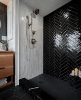 Gooseneck Tiny home with black and white tile shower, by Tru Form Tiny
