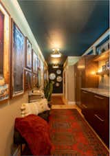 Inviting center hall where the owners photography is on display...