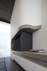 Curved wall fireplace - Butterfly House, Stafford Architecture 