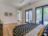 Master suite with large glass doors to covered porch