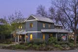 Extensive landscape, cared for by the owners, farm house lights accent the house
