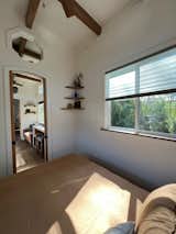a look out from the main-floor bedroom through the french pocket doors.