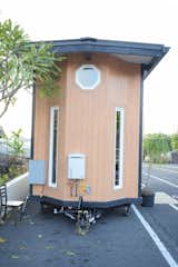 black white and wood exterior. The Paradise Model Tiny Home