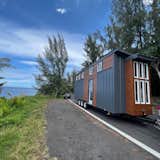 Tiny Home by the ocean in Hawaii protected from the ocean spray cladded in cedar and metal.