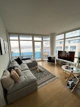 Overlooking the East River, Jeremiah Maestre's Brooklyn living room is ready to host a virtual training session.