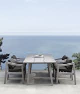 Host your next dinner party outside with the Del Mar Rectangular Dining Table. Sustainable weathered solid teak complements any outdoor surroundings— verdant gardens, seaside vistas, and blue skies. Paired here with the Del Mar Outdoor Dining Chair for a classically modern look.  Photo 2 of 7 in Mitchell Gold + Bob Williams  Launches Its First Outdoor Collection