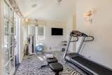 The home’s fitness studio encourages morning workouts. The space is flexible, with the option to transform it into another bedroom or office.&nbsp;