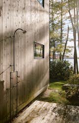The redesign includes a new outdoor shower and deck on the north side of the house.