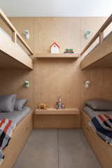 Bedroom, Bunks, Concrete, and Wall Cedar Grove House by HUNTERoffice bunk room  Bedroom Bunks Photos from HunterOffice Whistler
