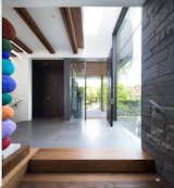 Hallway, Medium Hardwood Floor, and Slate Floor Entry Hall  Photo 14 of 17 in Pacific Spirit Residence by Frits de Vries Architects + Associates  Ltd.