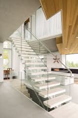 Staircase, Metal Railing, and Wood Tread  Photo 5 of 10 in Tolmie Residence by Frits de Vries Architects + Associates  Ltd.