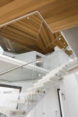 Staircase, Metal Railing, and Wood Tread  Photo 8 of 10 in Tolmie Residence by Frits de Vries Architects + Associates  Ltd.