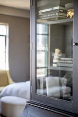 Places to store treasures warm up the space and add a personal touch.