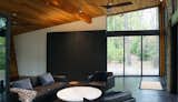 Shou-sugi-ban Japanese siding wraps the bathroom volume