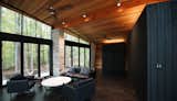 An additional sided volume conceals the kitchen