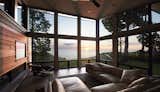 Windows, Awning Window Type, Wood, and Picture Window Type Living Room at sunset  Photo 8 of 14 in Holland House by Robert Neylan
