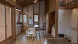 Looking toward kitchen, across living, with fold-slide door at left