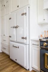 Not to be mistaken for cabinetry, Big Chill's Classic Fridge in White with Satin Nickel trim adds an extra element of luxury to the kitchen.