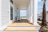 The property’s outdoors includes two porches on two stories for all-encompassing views in the coastal community. 
