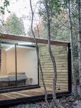 House in Chilean Forest by Lucas Maino bedroom and patio