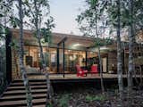 House in Chilean Forest by Lucas Maino patio and into the main living space