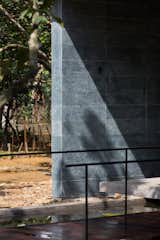 Blue-Green Stone Walls Anchor a Family’s Serene Retreat in Vietnam - Photo 10 of 20 - 