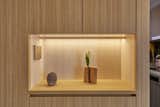 Storage Room Small nooks create moments of display in this otherwise minimal house in addition to providing a surface for resting items in the otherwise low-surface space home.  Photo 2 of 21 in Every Surface Serves a Purpose in This Tiny Apartment in Hong Kong