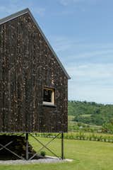 This Black Gable Country Home Looks Like It Was Broken in Half - Photo 16 of 22 - 