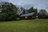 This Black Gable Country Home Looks Like It Was Broken in Half - Photo 22 of 22 - 