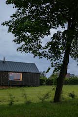 This Black Gable Country Home Looks Like It Was Broken in Half - Photo 21 of 22 - 