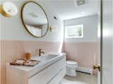 Bath Room, Recessed Lighting, Ceiling Lighting, Ceramic Tile Floor, Two Piece Toilet, Laminate Counter, Drop In Sink, Ceramic Tile Wall, and Wall Lighting  Photo 19 of 24 in Villacarillo House by Ron Villacarillo