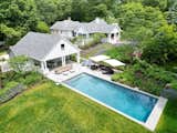 Outdoor, Large Patio, Porch, Deck, Flowers, Swimming Pools, Tubs, Shower, Grass, Back Yard, and Trees  Photo 7 of 10 in Shelter Island Retreat by Michael Lewis
