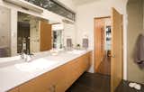 Bath Room, Ceramic Tile Floor, Ceiling Lighting, Wall Lighting, Granite Counter, and Vessel Sink Hansen Road Home bathroom  Photo 7 of 22 in Hansen Road Home by Coates Design Seattle Architects