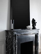 Custom-made masterpiece in black marble and bronze.