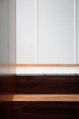 Terrazzo floor and walnut staircase detail