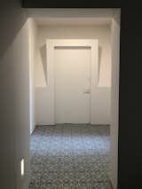 All interior doors in the home are frameless flush to wall doors.  A long hallway of twelve of these "hidden doors" culminate in the entry to the master suite.  Recessed night lights illuminate the path through the home at night.
