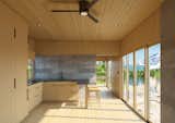Kitchen, Quartzite Counter, Wood Cabinet, Light Hardwood Floor, Refrigerator, and Cooktops When you value the natural world, you craft a home that honours it.  Photo 5 of 7 in Bungalow by Lloyoll Prefabs