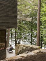 The home was partially designed around a large glacial boulder.