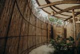 Doors and Exterior Reed membrane creates privacy  Photo 5 of 24 in Bamboo Flower _Restroom pavillion by Manu Ponte