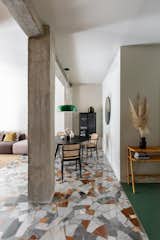 Living Room, Ceiling Lighting, Marble Floor, Shelves, Chair, Storage, Media Cabinet, Sofa, and Lamps  Photo 9 of 16 in CASA SA by KICK.OFFICE