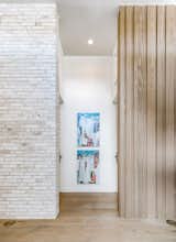 A myriad of high-end materials exhibits an art gallery experience throughout. 